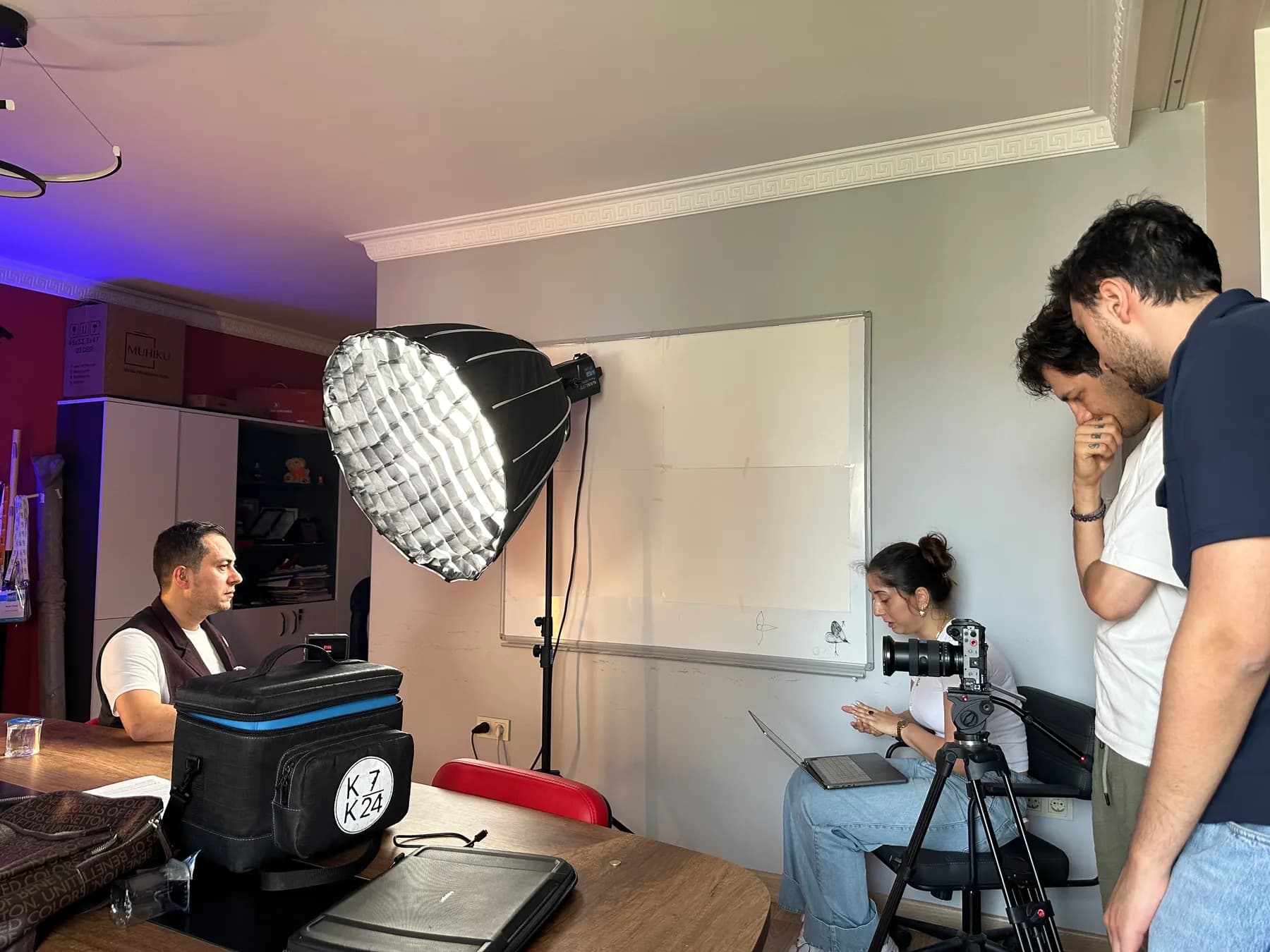 Multimediatick crew running the AktifEdu office shoot with camera, lighting and sound equipment