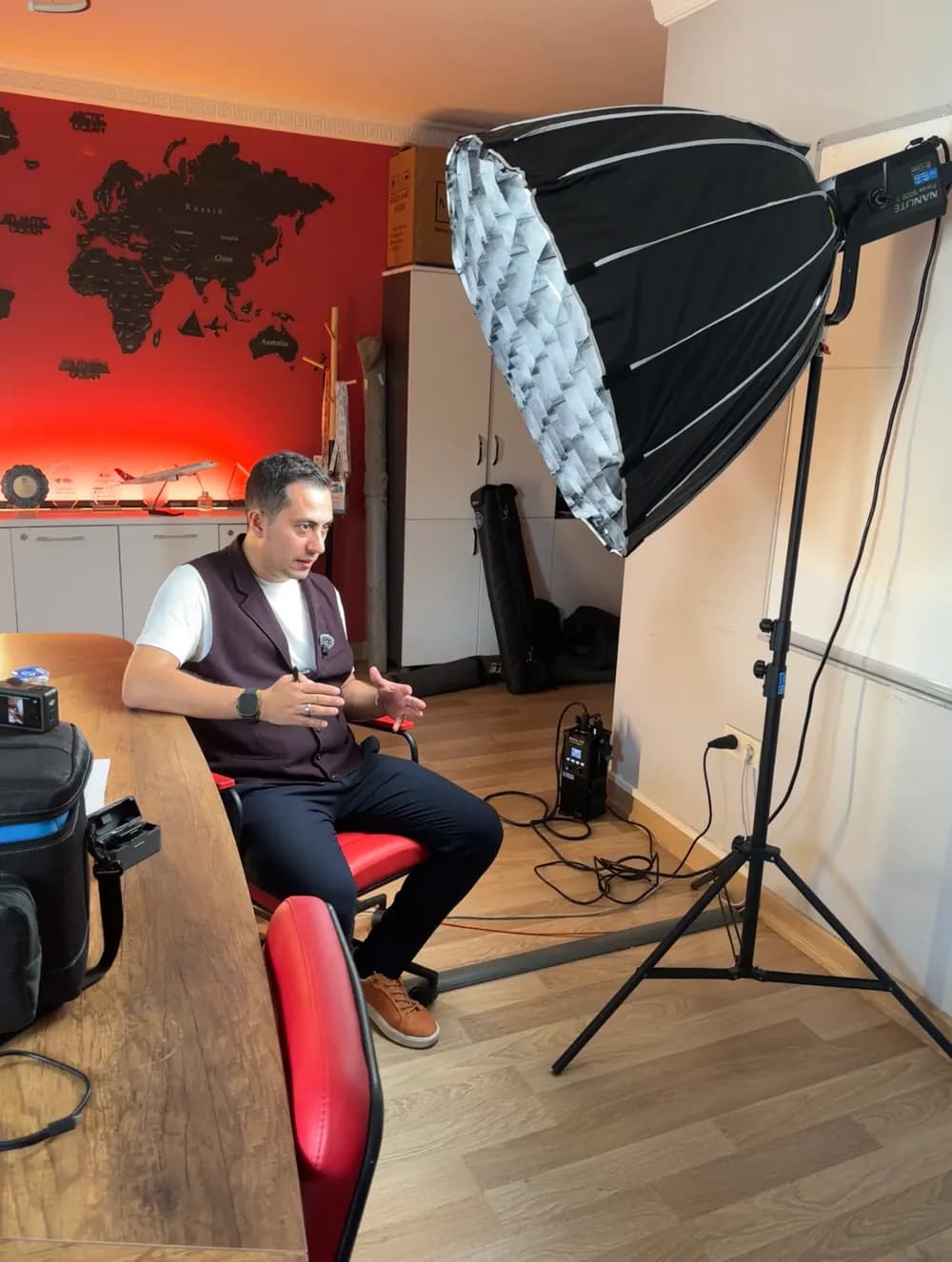 Speaker, softbox lighting and audio setup for an AktifEdu corporate interview video